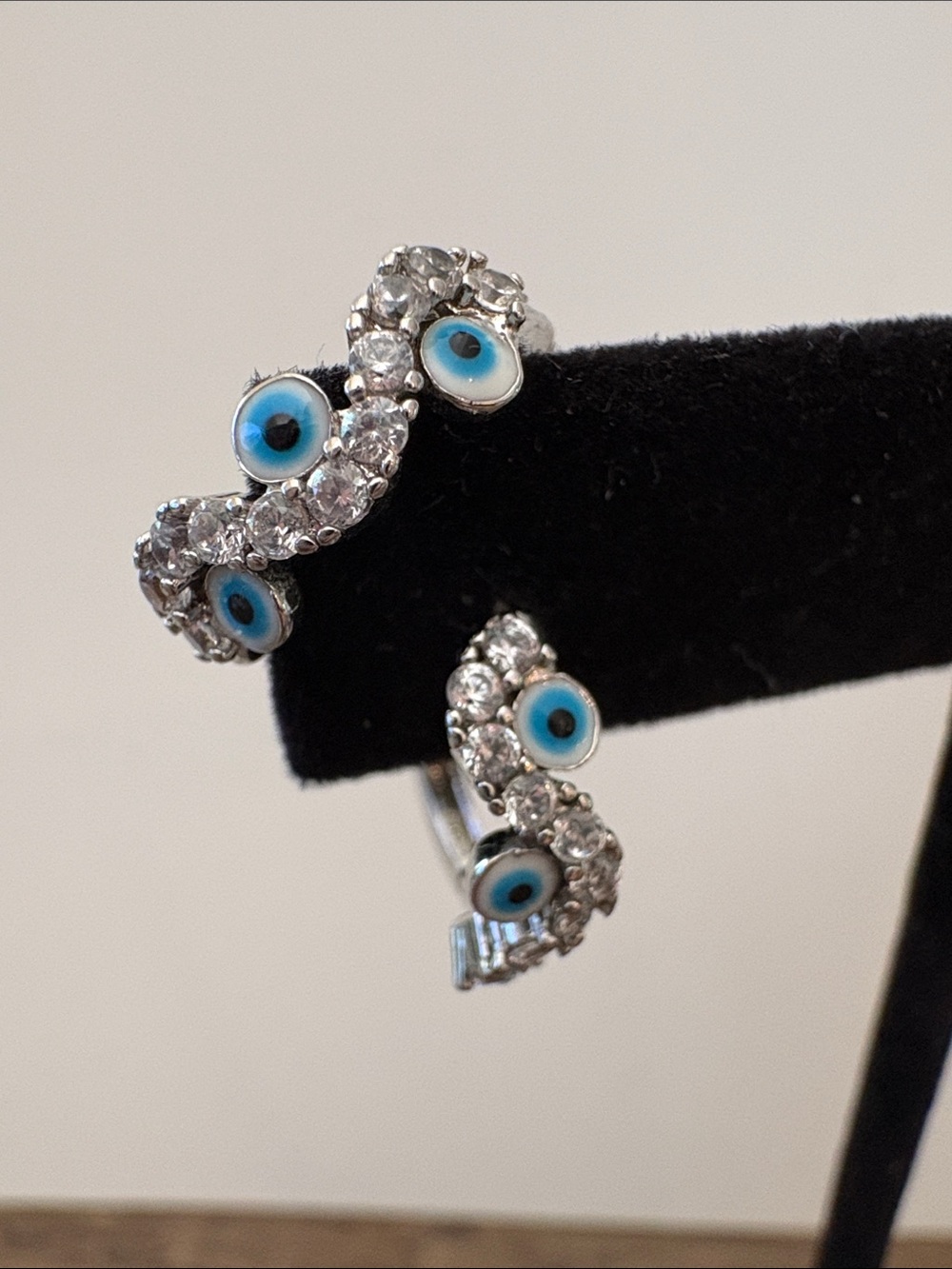 Silver Crystal Hoop Earrings with Blue Evil Eye Accents